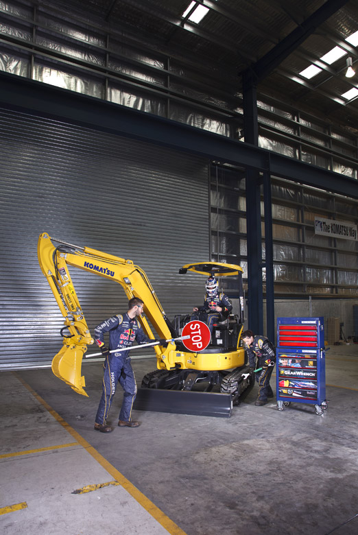 industrial photographer brisbane komatsu red bull mini excavator image photography brief